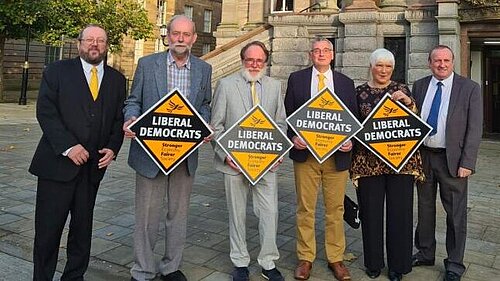 Wirral Liberal Democrat councillors outside of Town Hall.